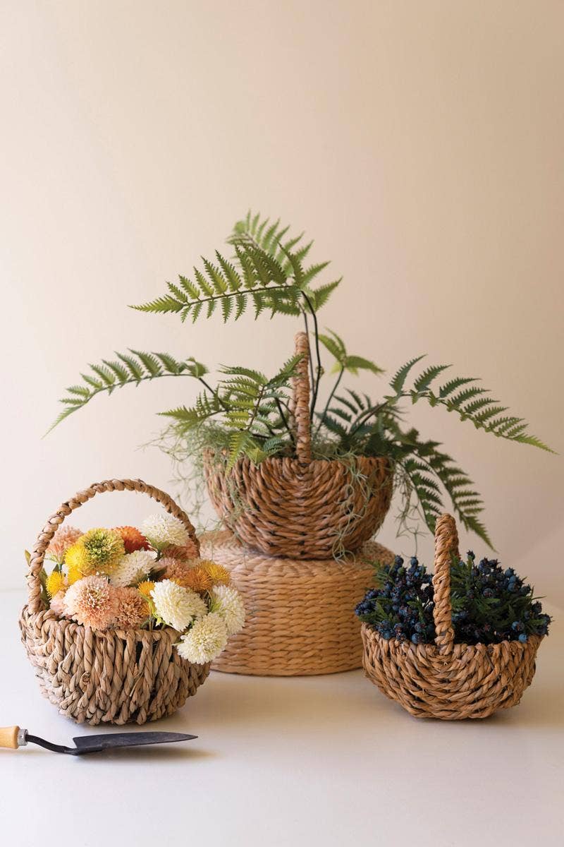 SET OF THREE WOVEN SEAGRASS BASKETS WITH HANDLES