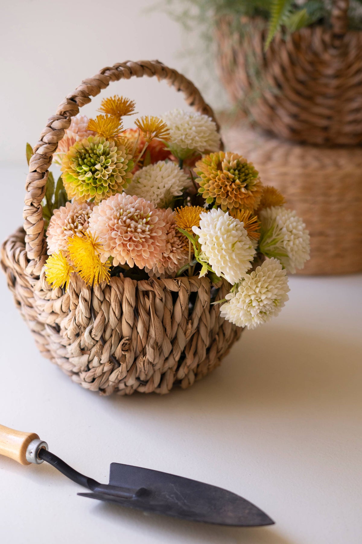 SET OF THREE WOVEN SEAGRASS BASKETS WITH HANDLES